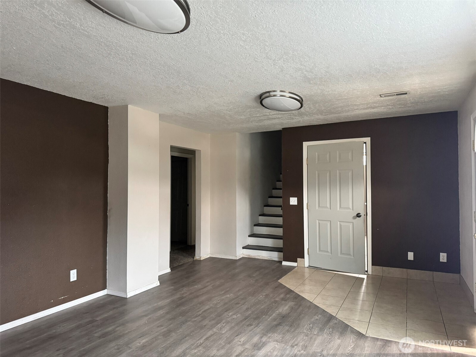 21 Orchard Loop North Tonasket, WA 98855 - Photo 17 of 23 a view of an empty room with stairs and a room