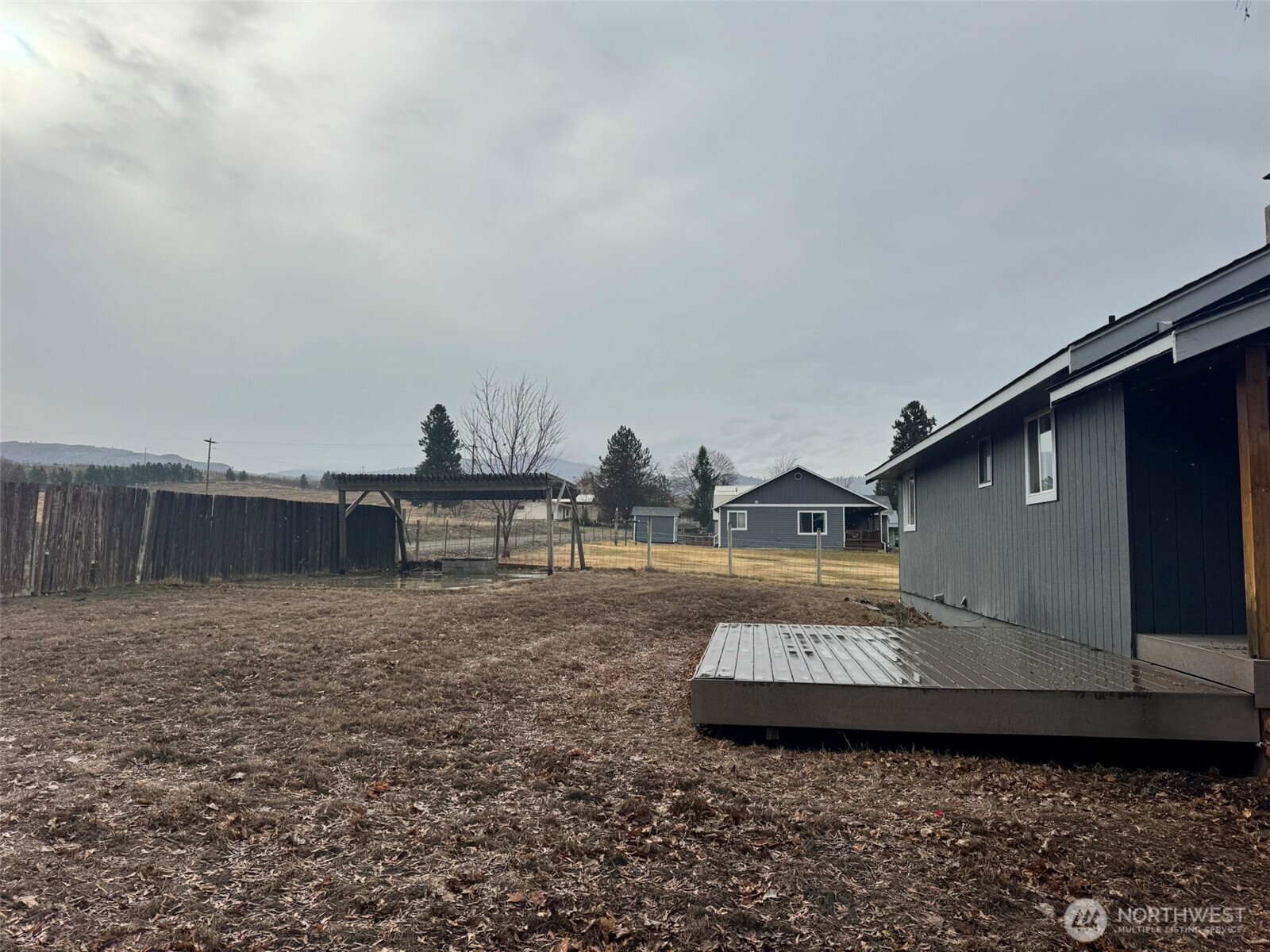 21 Orchard Loop North Tonasket, WA 98855 - Photo 23 of 23 a view of a back yard of the house