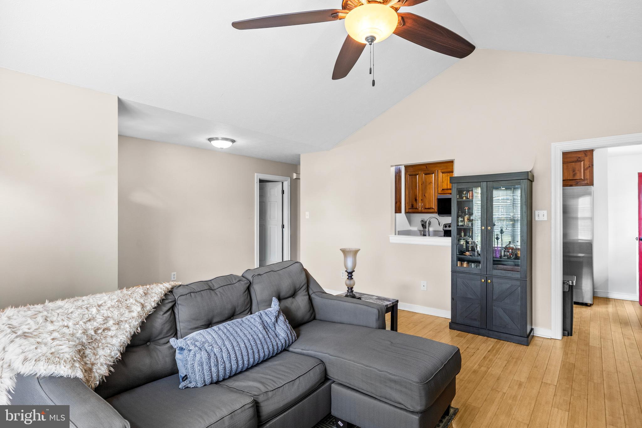 151 Deep Landing Road Tappahannock, VA 22560 - Photo 9 of 31 Vaulted ceilings and ceiling fan light fixture