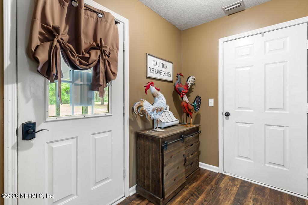 28317 Pike Road Hilliard, FL 32046 - Photo 13 of 42 a view of walk in closet