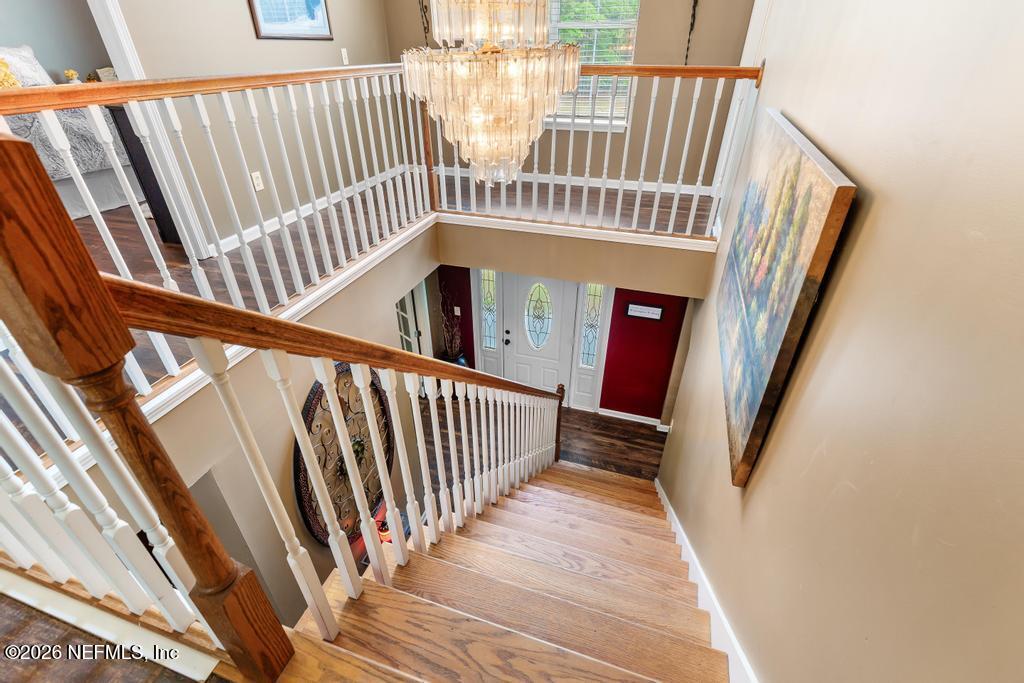 28317 Pike Road Hilliard, FL 32046 - Photo 22 of 42 a view of entryway with wooden floor