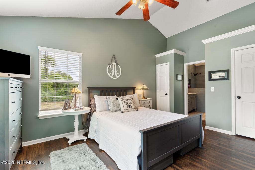 28317 Pike Road Hilliard, FL 32046 - Photo 31 of 42 a bedroom with a bed and a window