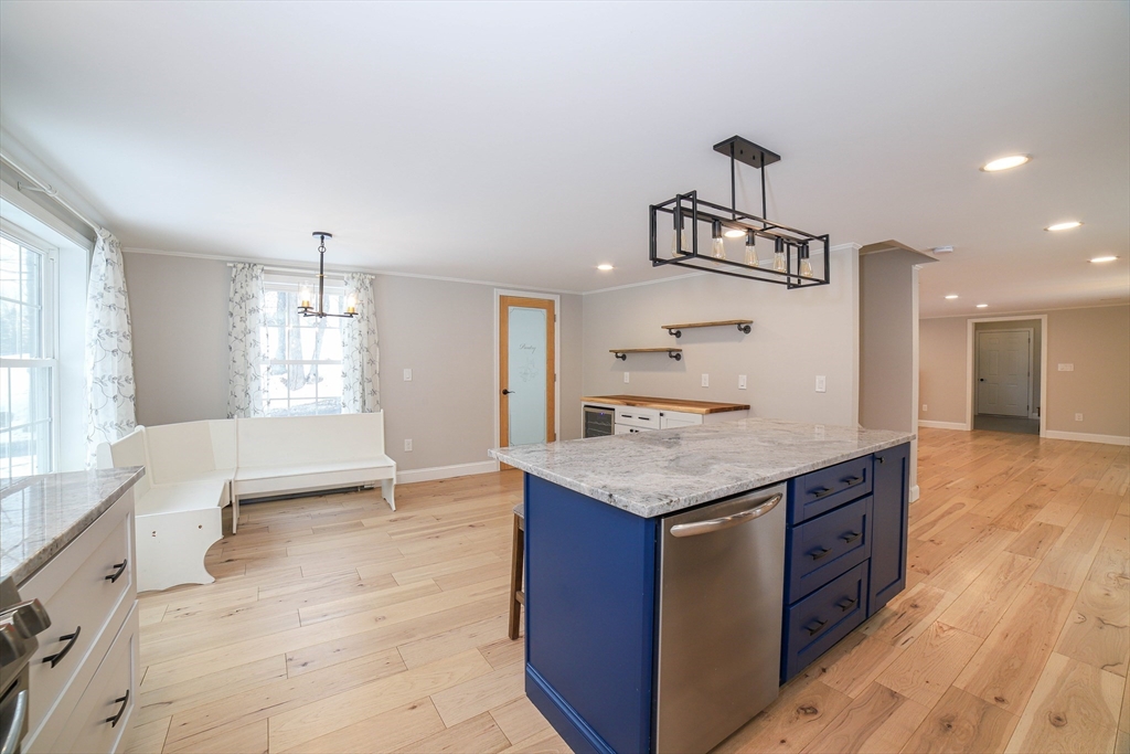 3 Woods Road Westminster, MA 01473 - Photo 6 of 42 a kitchen with granite countertop a stove and a sink
