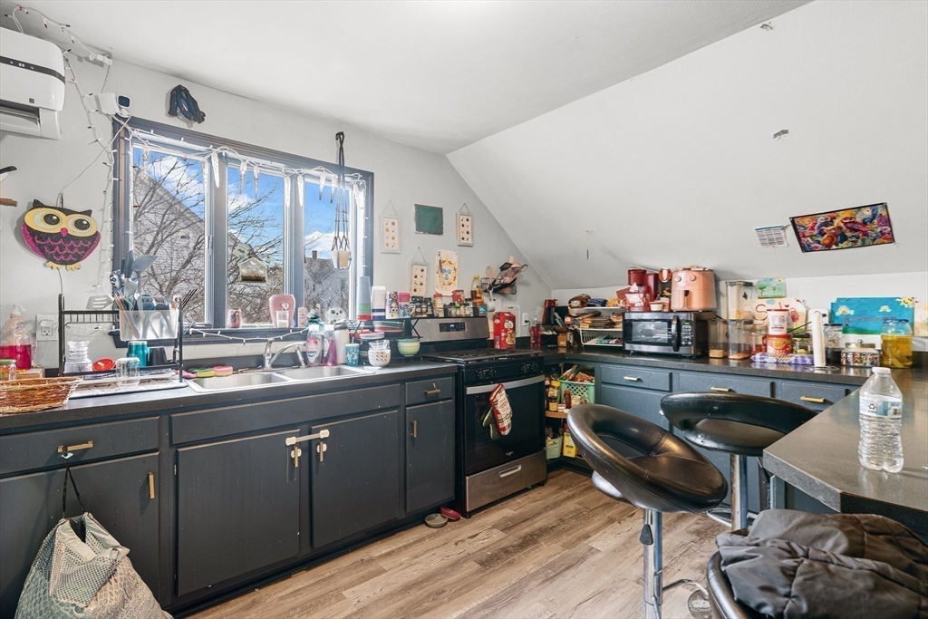 640 South Main Street Fall River, MA 02721 - Photo 22 of 33 a kitchen with a sink and cabinets