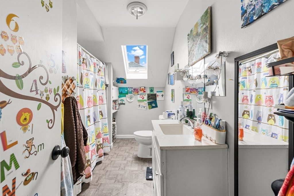 640 South Main Street Fall River, MA 02721 - Photo 26 of 33 a view of a livingroom with fridge and workspace