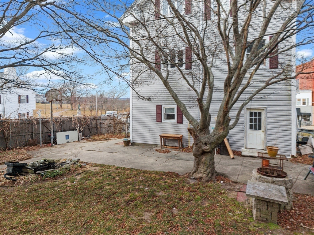 640 South Main Street Fall River, MA 02721 - Photo 30 of 33 a backyard of a house with seating space