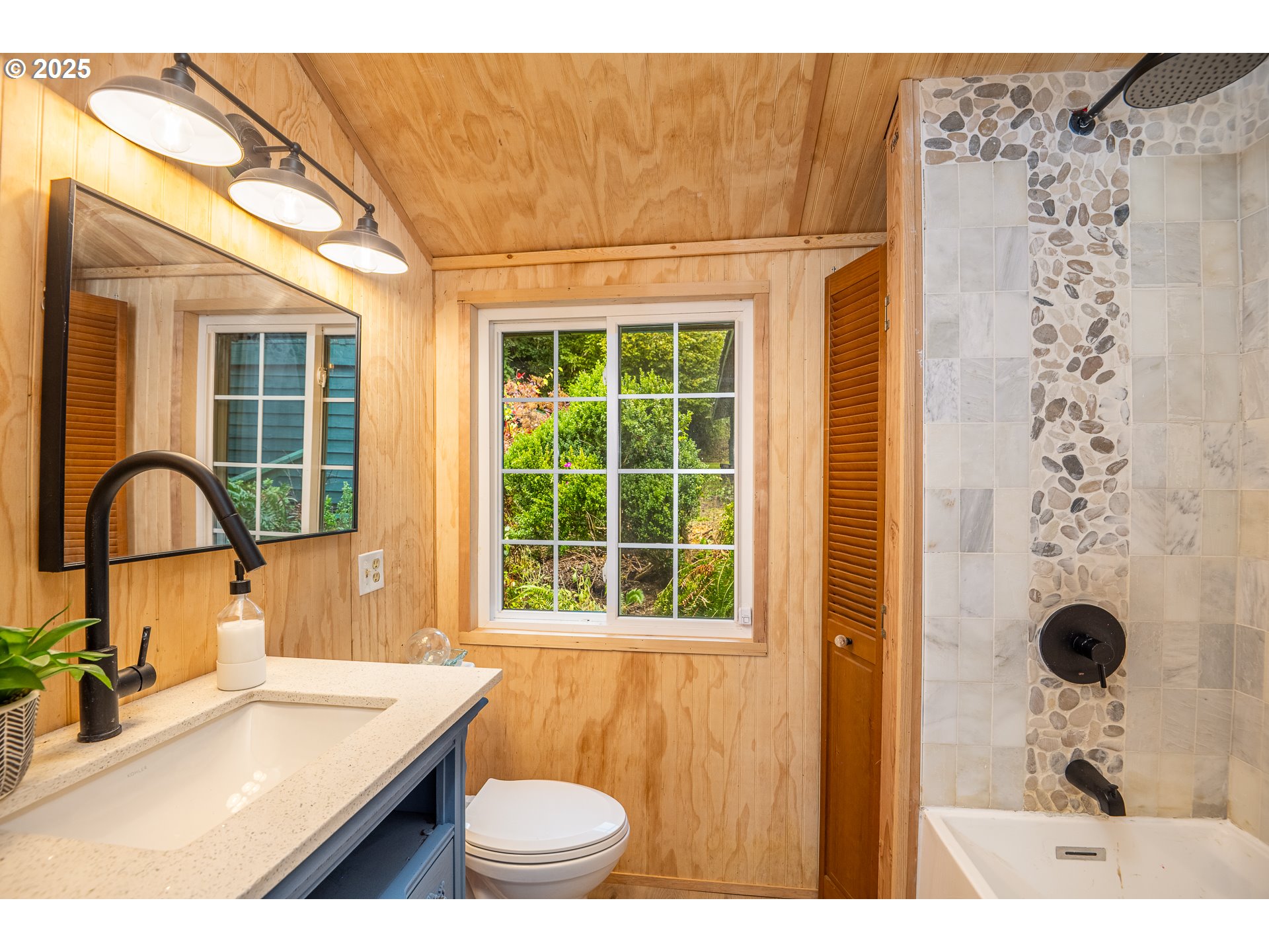 29 Neal Loop Toledo, OR 97391 - Photo 21 of 45 a bathroom with a sink and a mirror