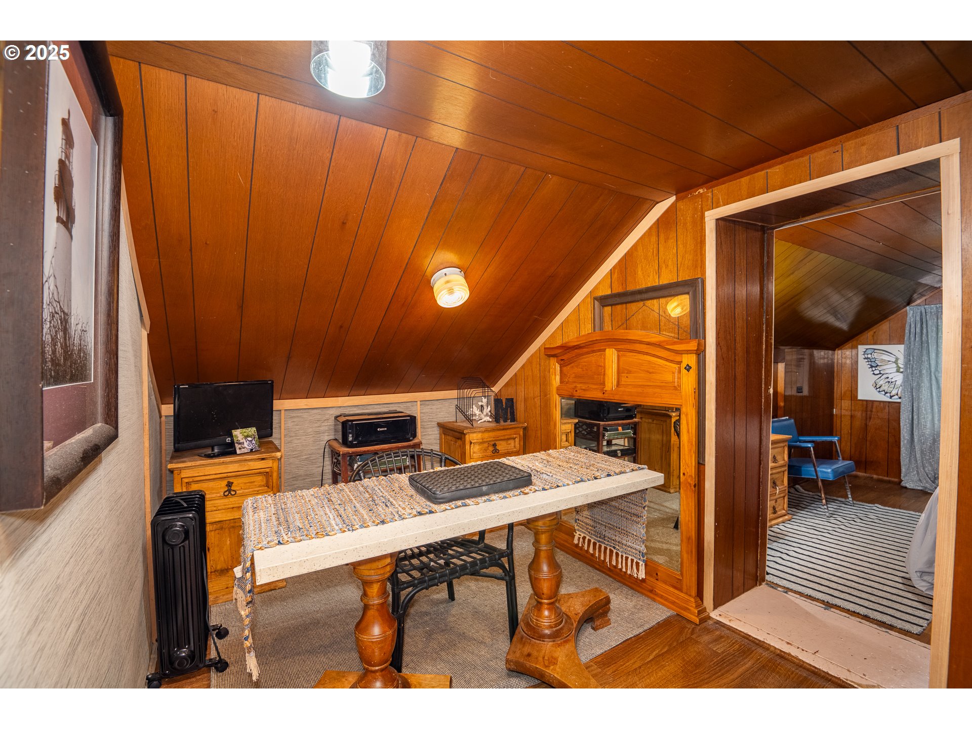 29 Neal Loop Toledo, OR 97391 - Photo 23 of 45 a view of workspace with wooden floor