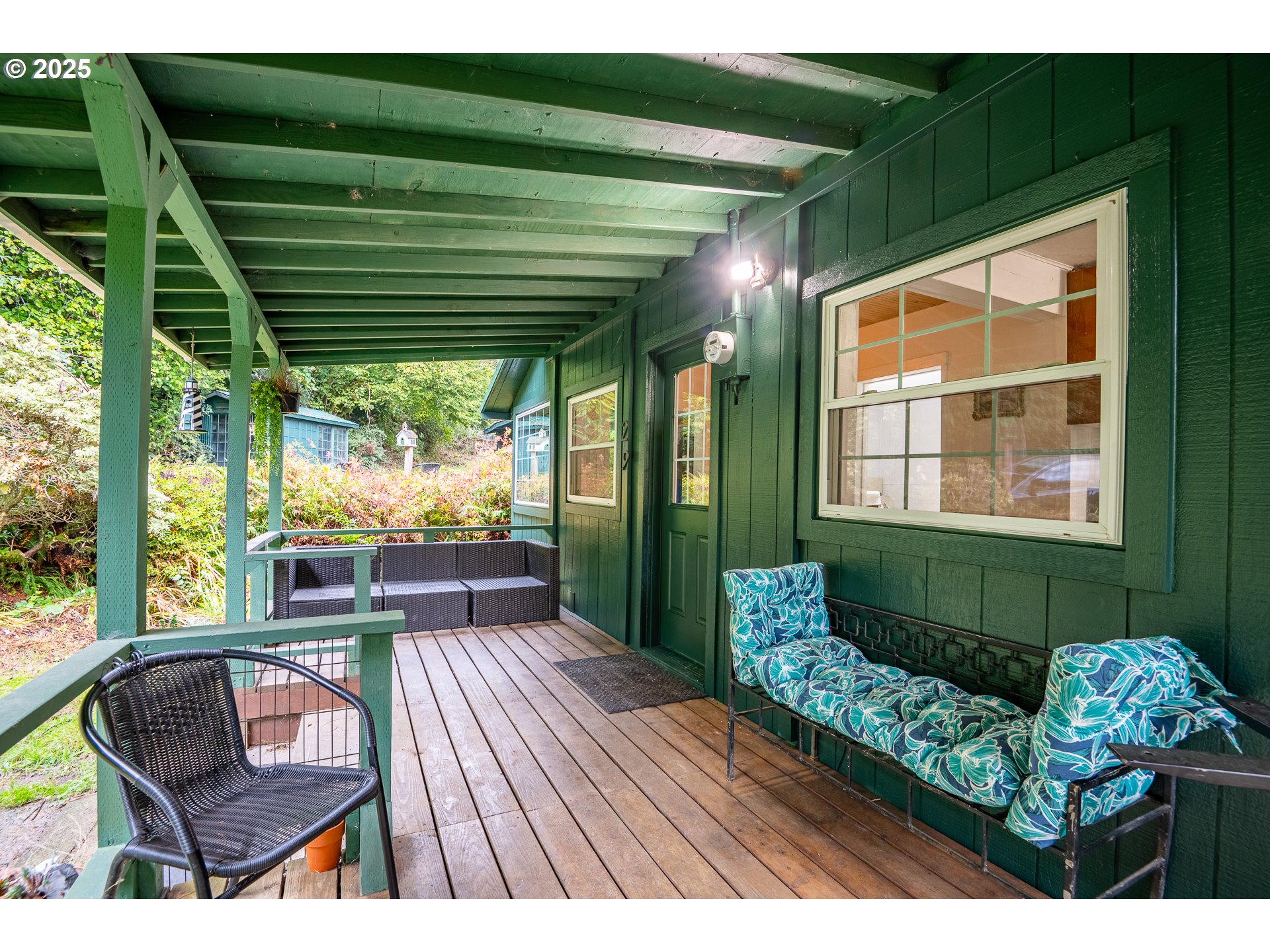 29 Neal Loop Toledo, OR 97391 - Photo 4 of 45 a outdoor living space with furniture and garden view