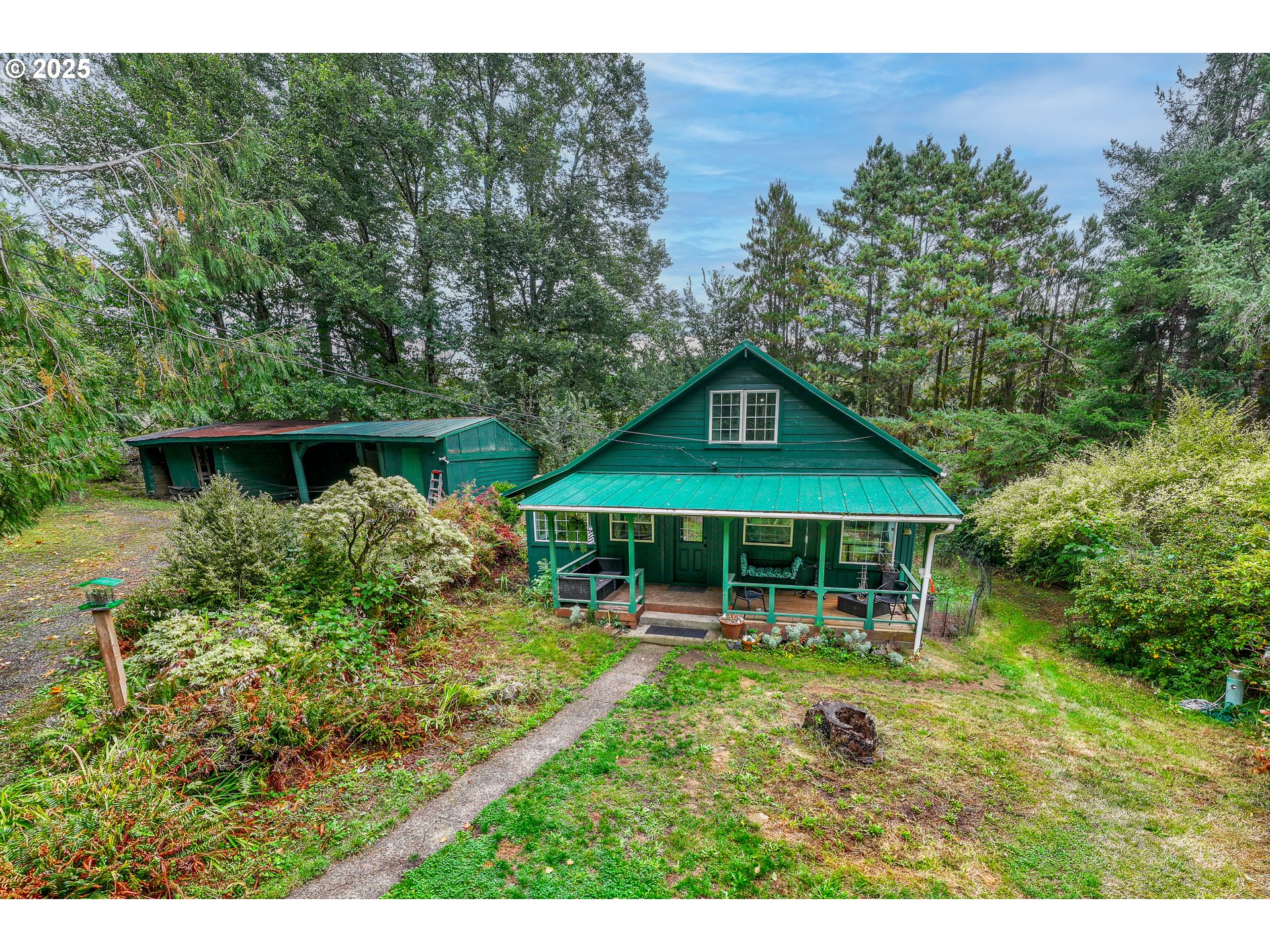 29 Neal Loop Toledo, OR 97391 - Photo 43 of 45 a view of a house with a yard