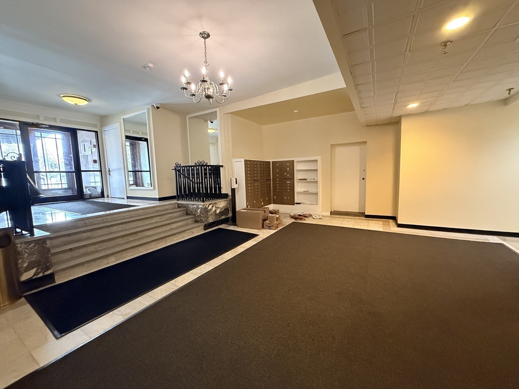 464 Commonwealth Avenue, Unit 72 Boston, MA 02215 - Photo 11 of 18 a view of a livingroom with furniture window and wooden floor