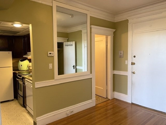 464 Commonwealth Avenue, Unit 72 Boston, MA 02215 - Photo 5 of 18 wooden floor in an empty room