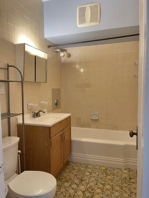 464 Commonwealth Avenue, Unit 72 Boston, MA 02215 - Photo 8 of 18 a bathroom with a sink a toilet and shower