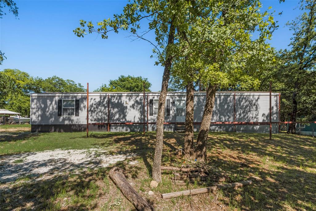 60 Tecumseh Road Valley View, TX 76272 - Photo 3 of 17 a view of a park with large trees
