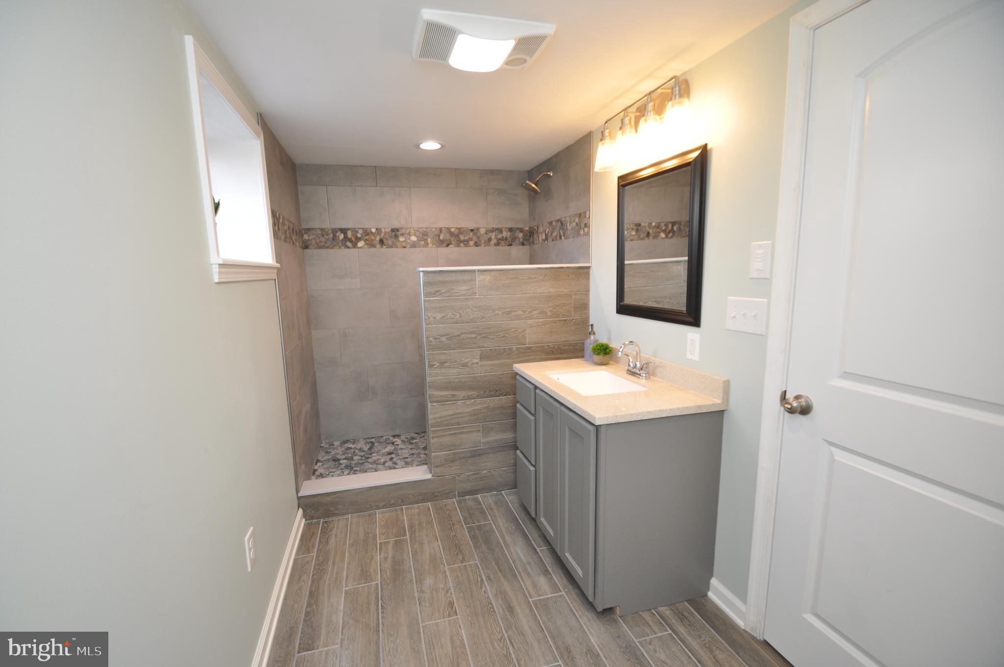 690 Georgetown Road Littlestown, PA 17340 - Photo 19 of 32 Awesome full bath on lower level.