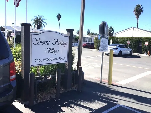a view of a street with sitting area