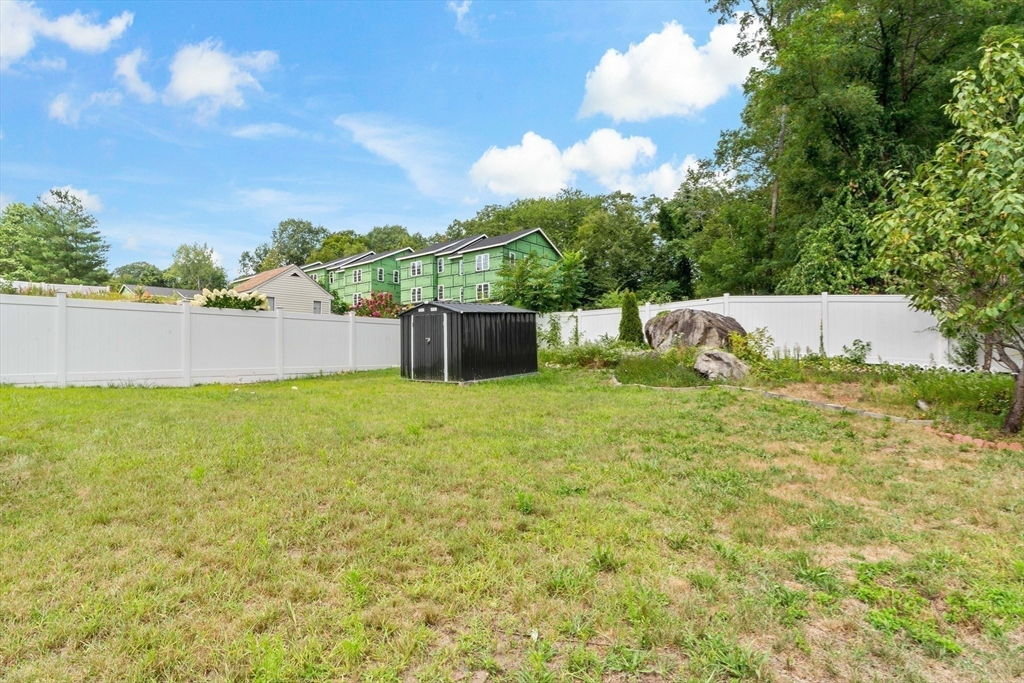45 Fourth Street, Unit RIGHT Worcester, MA 01602 - Photo 18 of 21 a view of swimming pool with seating area and green space