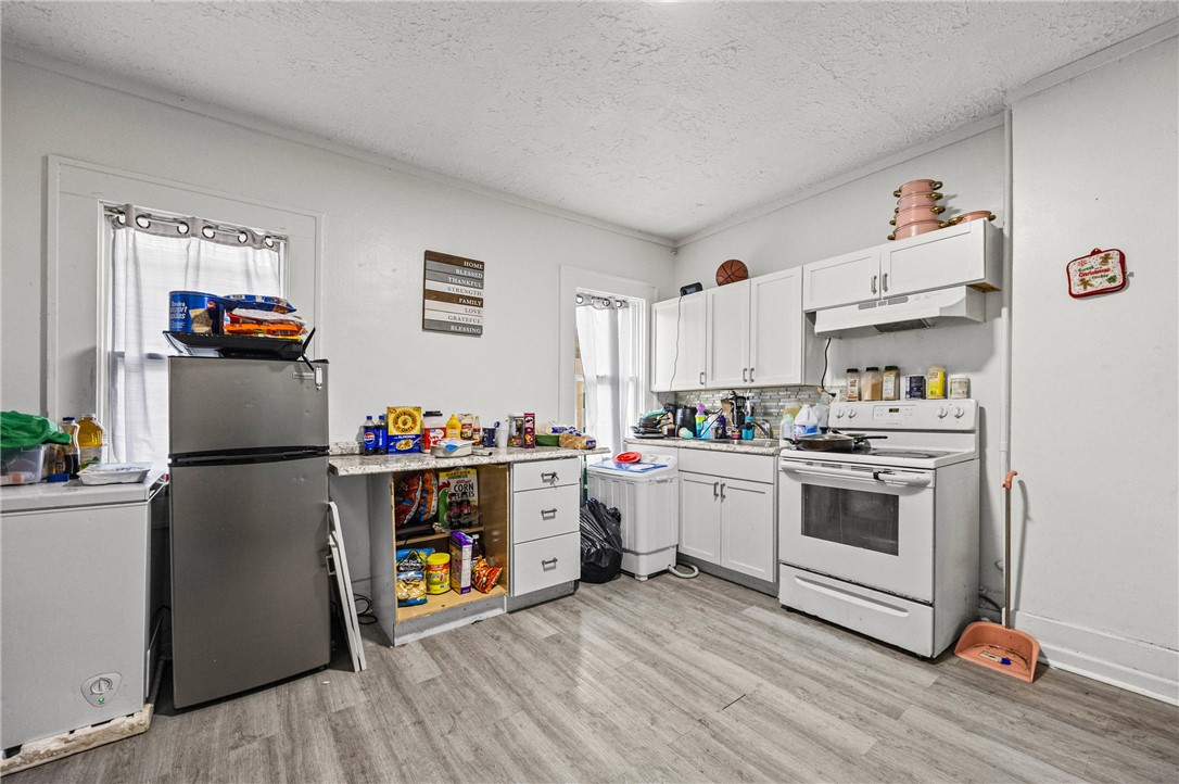 641 Jay Street Rochester, NY 14611 - Photo 16 of 29 Lower unit kitchen