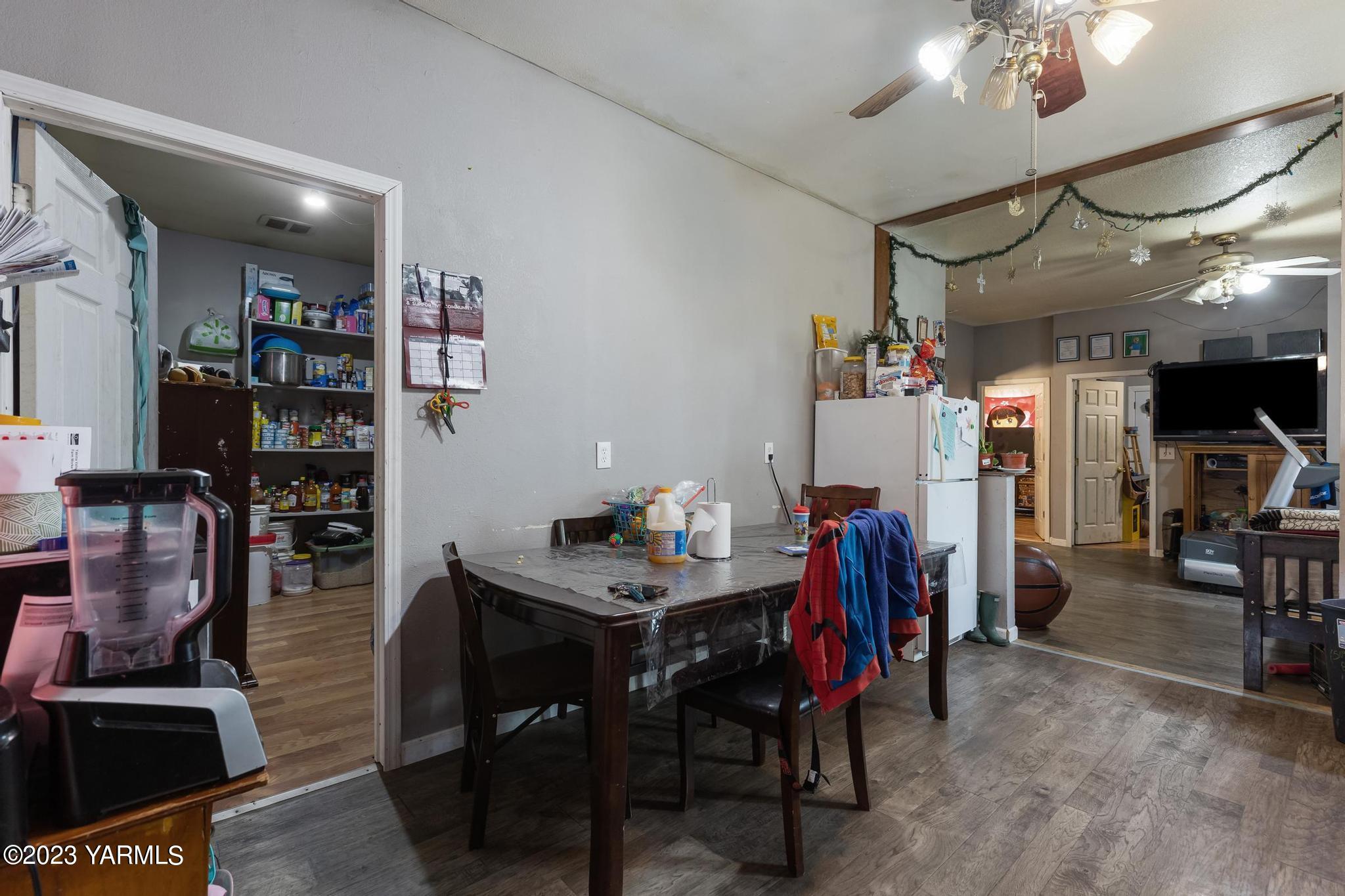 131 Ogle Road Grandview, WA 98930 - Photo 22 of 41 a view of a dining room with furniture