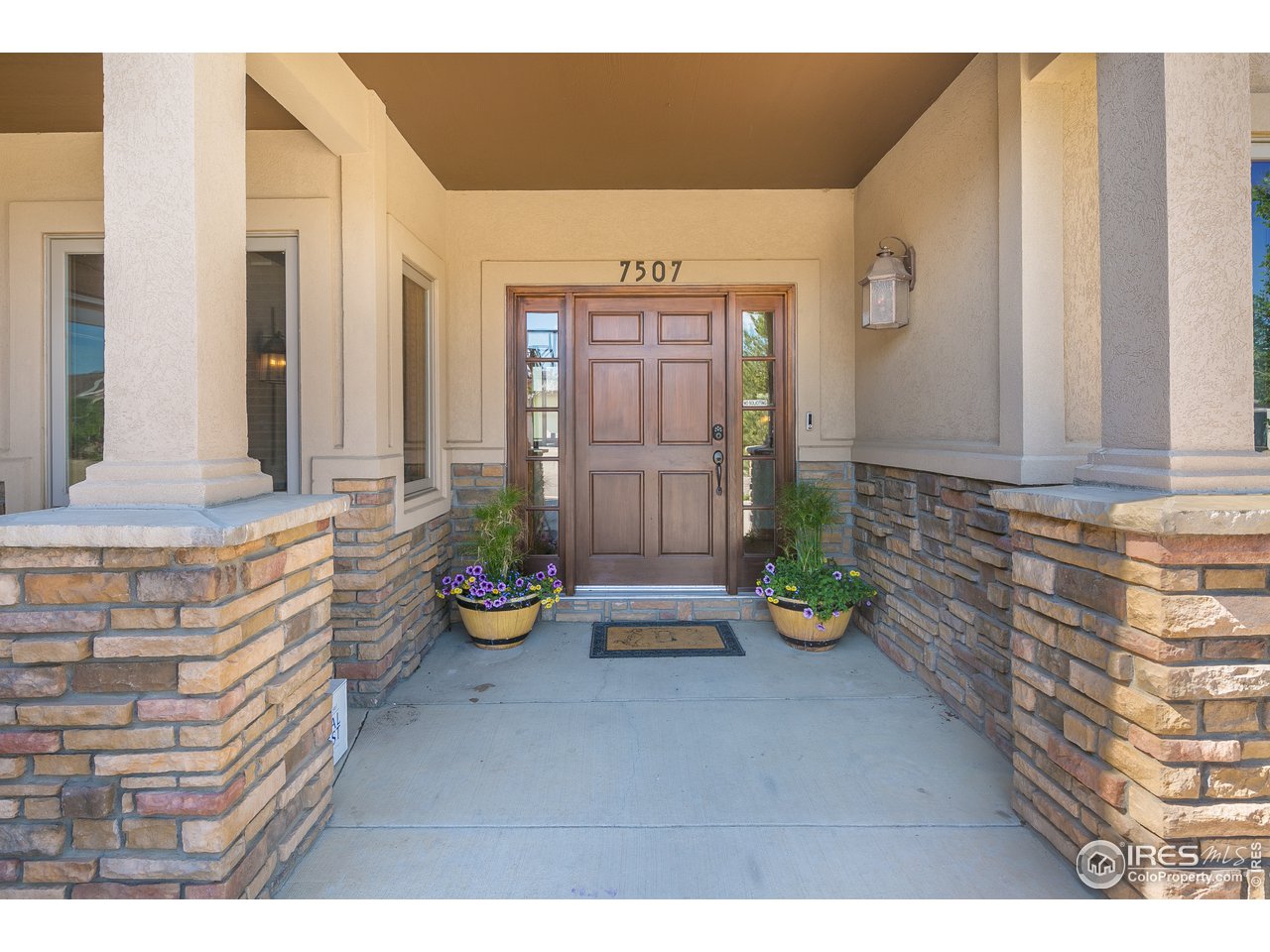 7507 Plateau Road Greeley, CO 80634 - Photo 6 of 35 Covered Front Porch