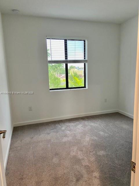20626 Northeast 5th Place, Unit 20626 Miami, FL 33179 - Photo 19 of 34 an empty room with a window