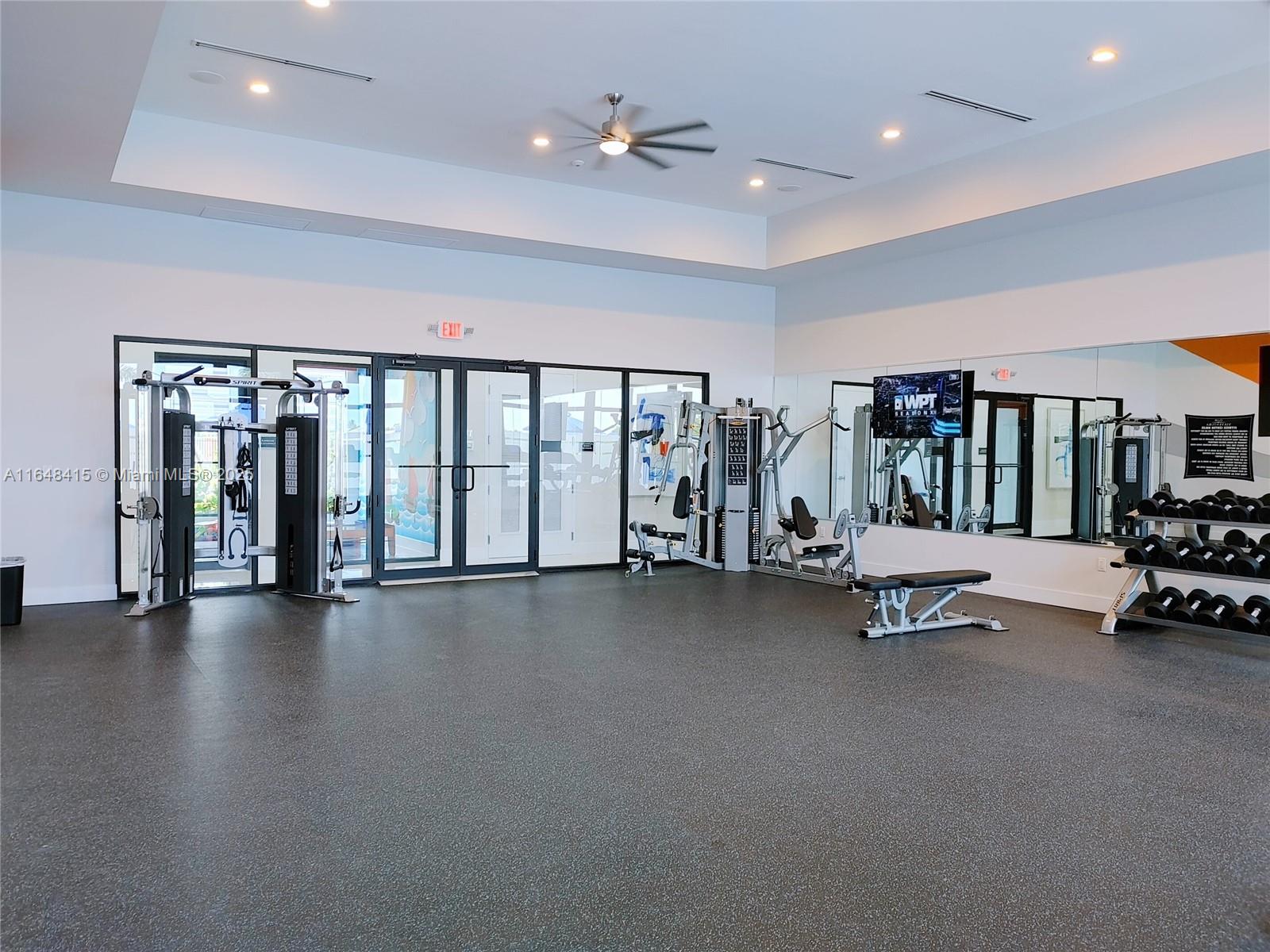 20626 Northeast 5th Place, Unit 20626 Miami, FL 33179 - Photo 29 of 34 a big room with table and chairs