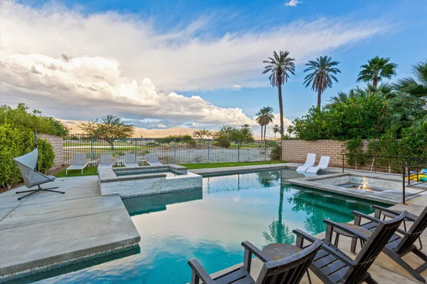 a view of sitting area in backyard