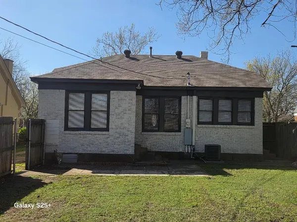 a house view with a garden space