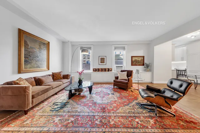 a living room with furniture or couch and a window