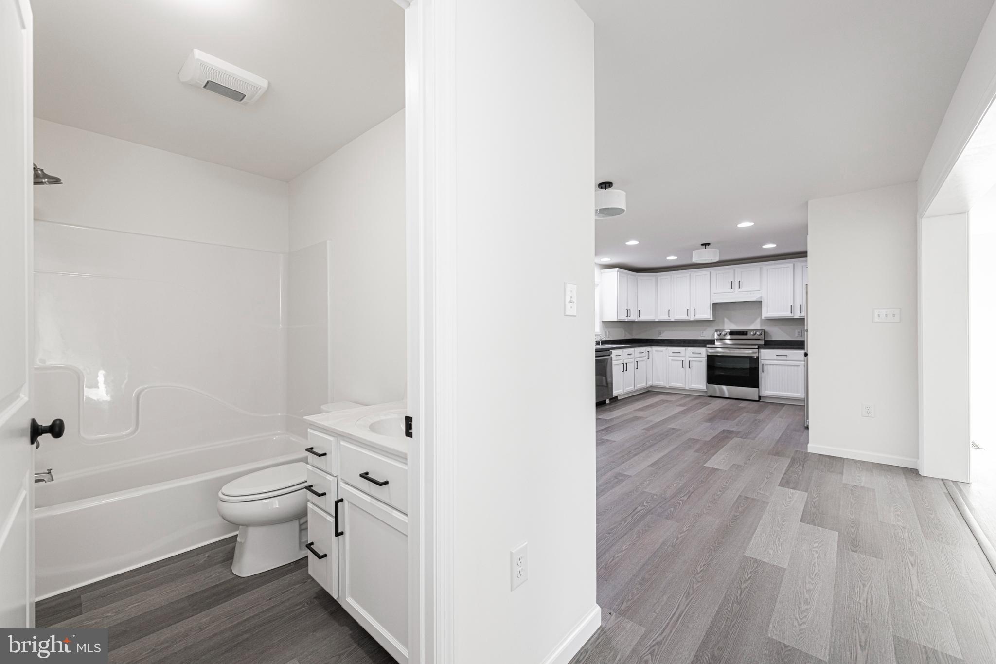 617 Port Providence Road Phoenixville, PA 19460 - Photo 12 of 25 a view of kitchen with wooden floor and electronic appliances