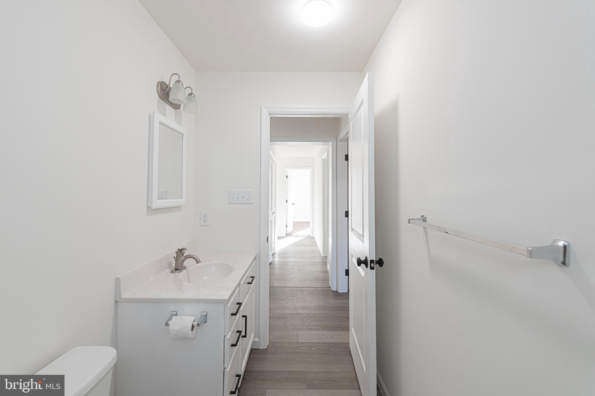 617 Port Providence Road Phoenixville, PA 19460 - Photo 13 of 25 a bathroom with a sink a toilet and shower