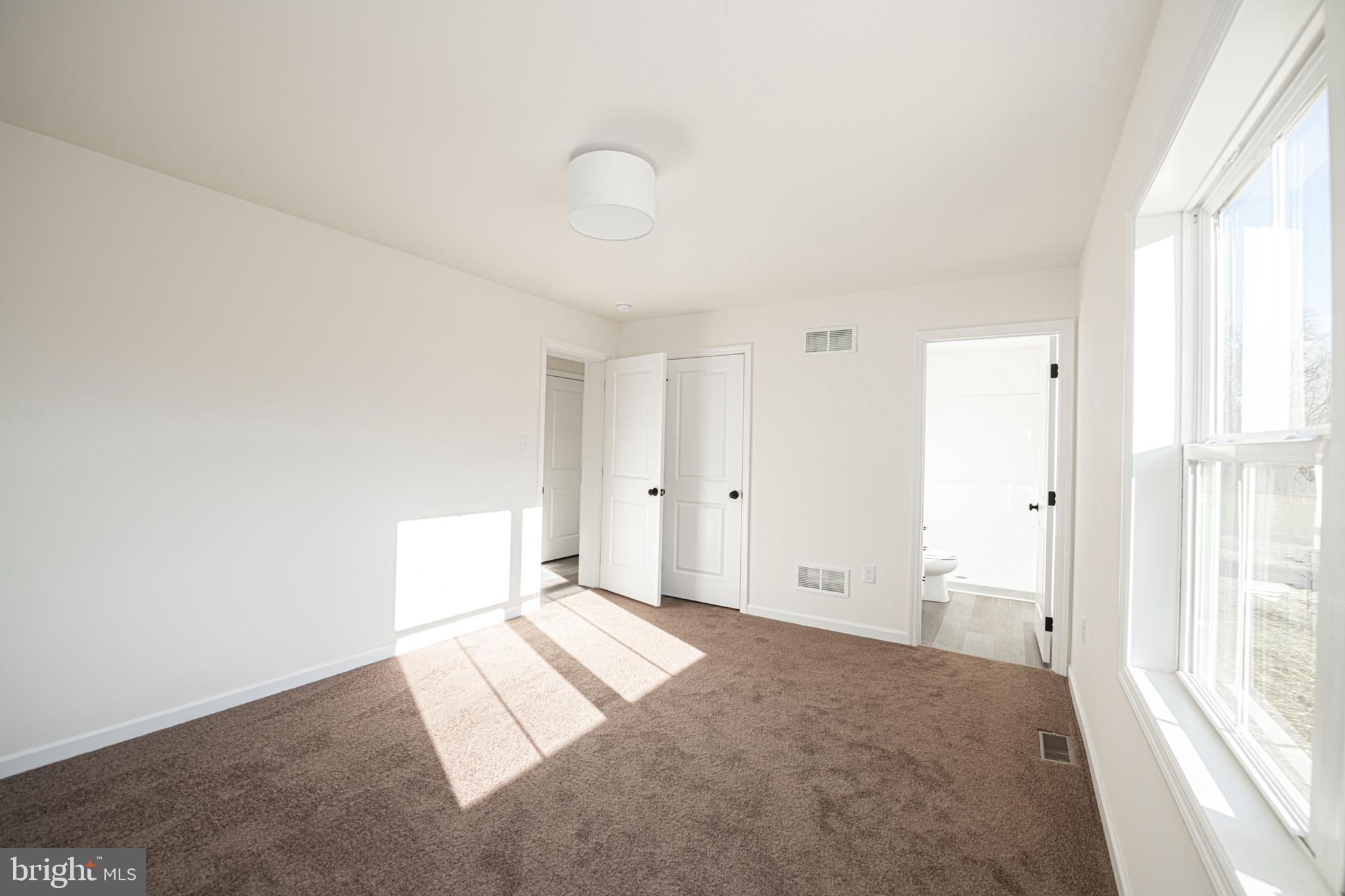 617 Port Providence Road Phoenixville, PA 19460 - Photo 16 of 25 a bedroom with a bed and a window