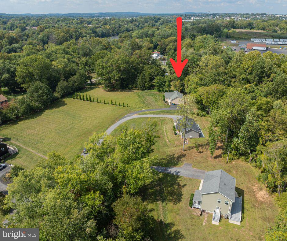 617 Port Providence Road Phoenixville, PA 19460 - Photo 3 of 25 an aerial view of a house with a yard and lake view