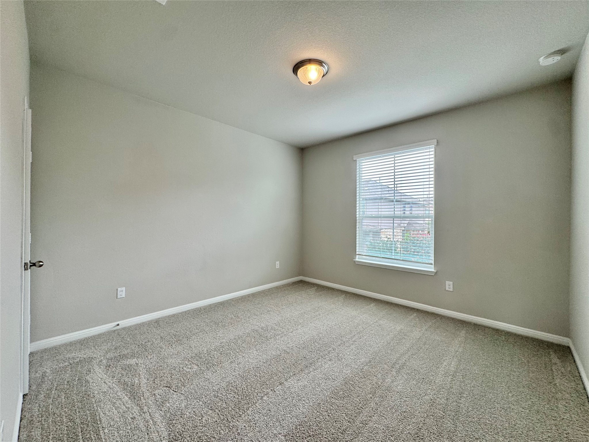 407 Rhetoric Way Pflugerville, TX 78660 - Photo 23 of 38 an empty room with a window