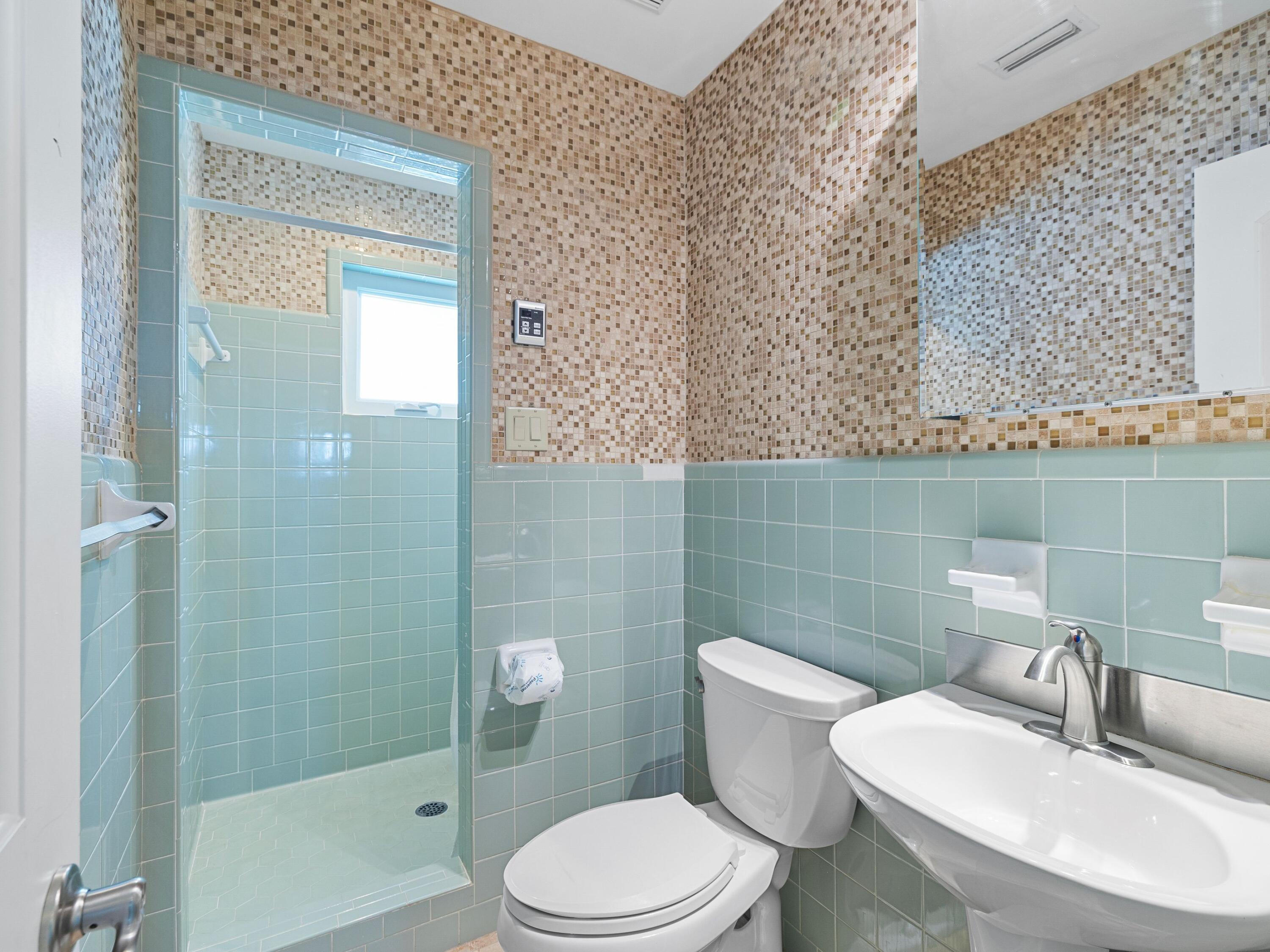 36 Green Street Inlet Beach, FL 32461 - Photo 22 of 27 a bathroom with a sink a toilet and shower