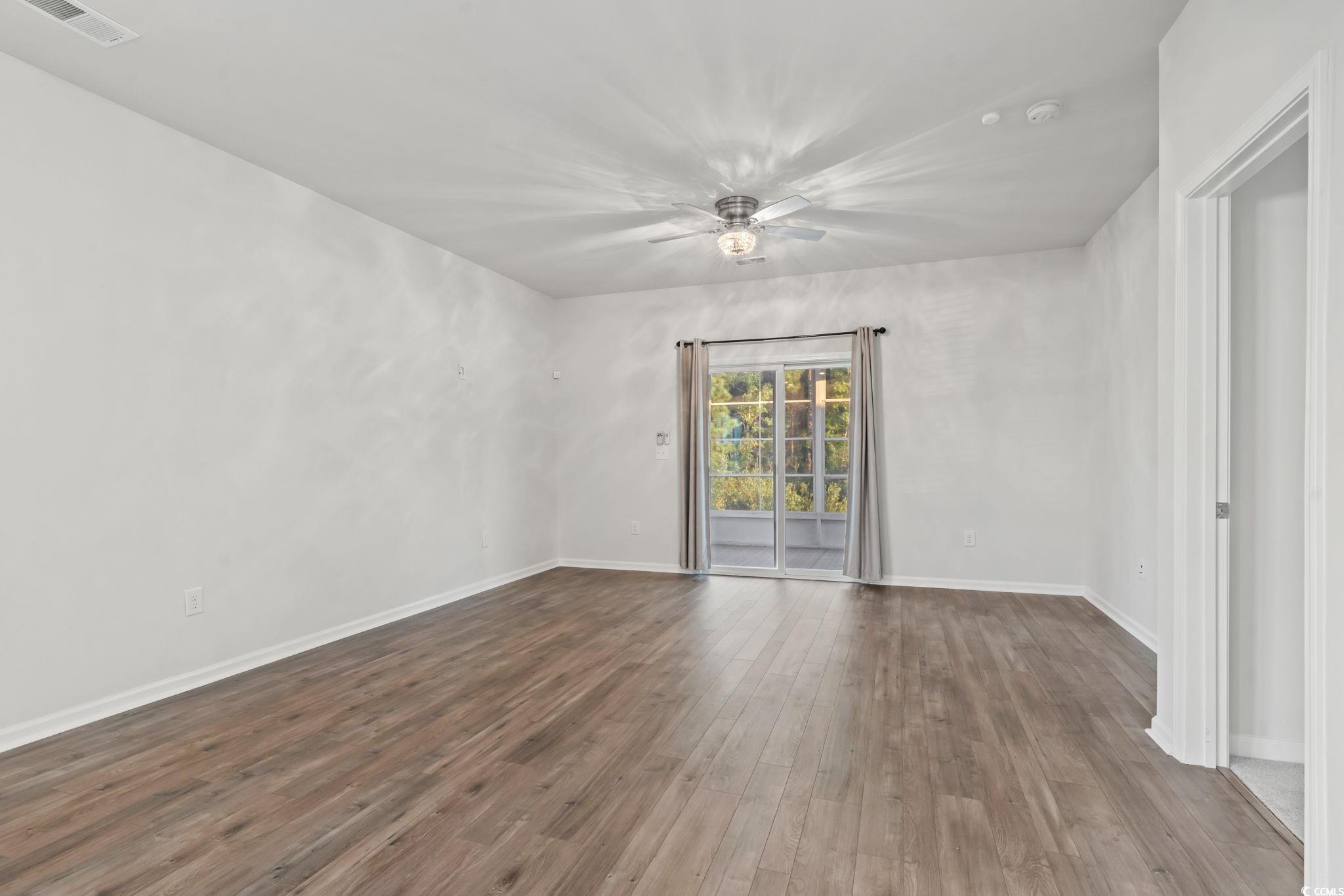 229 Cypress Tree Loop Longs, SC 29568 - Photo 17 of 40 Spare room with ceiling fan and hardwood / wood-st