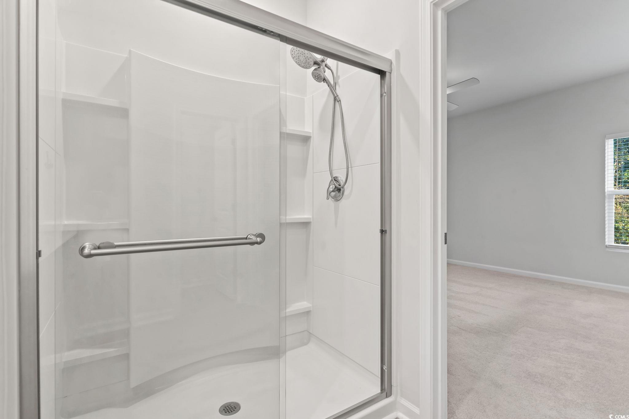 229 Cypress Tree Loop Longs, SC 29568 - Photo 21 of 40 Bathroom with a shower with shower door