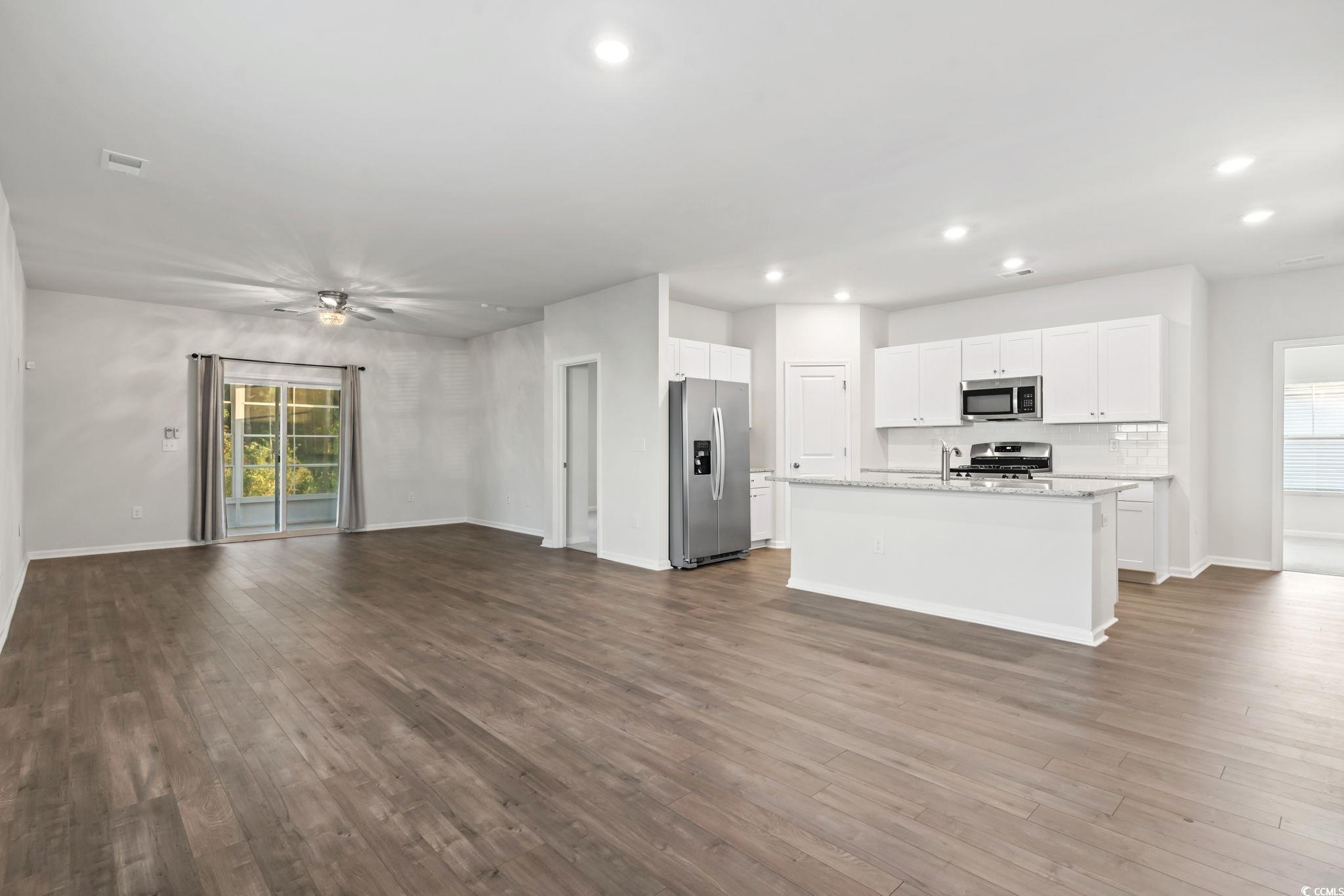 229 Cypress Tree Loop Longs, SC 29568 - Photo 3 of 40 Kitchen with appliances with stainless steel finis
