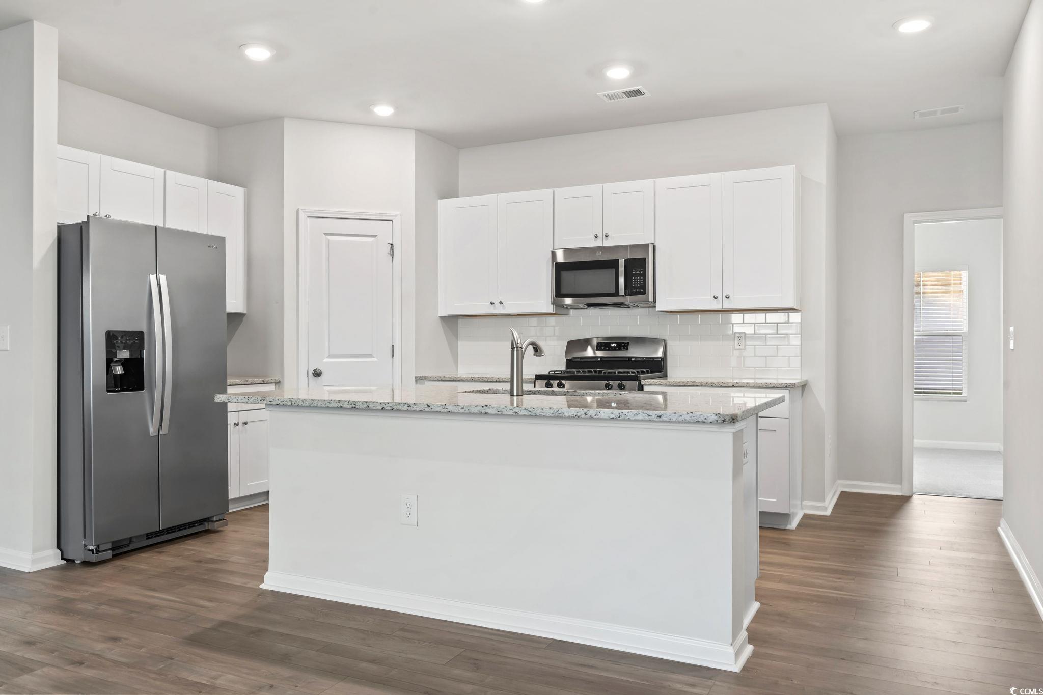 229 Cypress Tree Loop Longs, SC 29568 - Photo 5 of 40 Kitchen featuring stainless steel appliances, dark