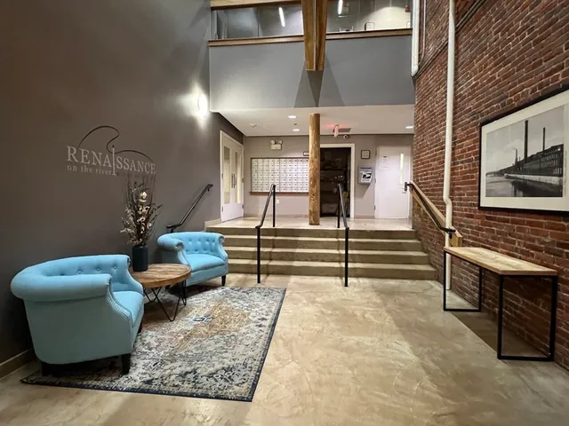 a room with furniture and a fireplace