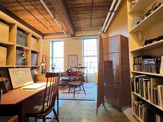 a view of a livingroom with furniture