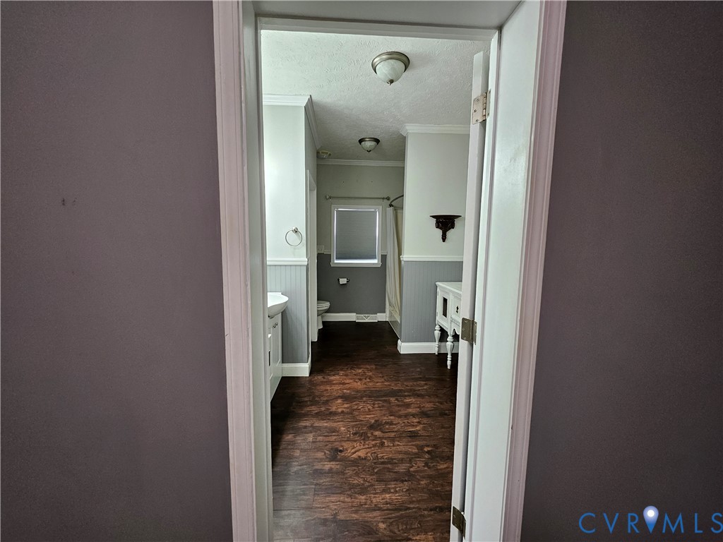 5195 Lennie Road McKenney, VA 23872 - Photo 20 of 45 a view of a hallway with a door and couch