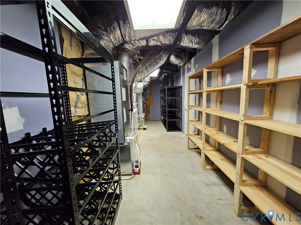 5195 Lennie Road McKenney, VA 23872 - Photo 41 of 45 a view of walk in closet with clothes and shoes