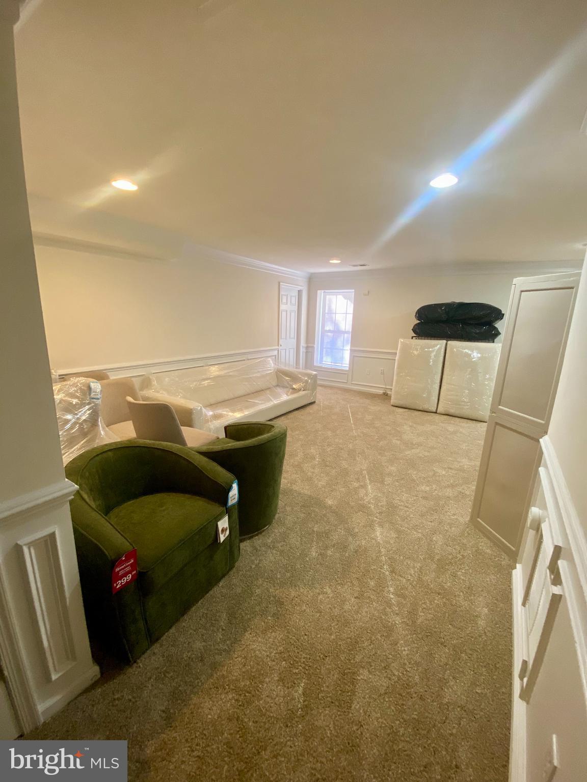 108 Davidson Street Stafford, VA 22554 - Photo 20 of 32 a living room with furniture and a couch