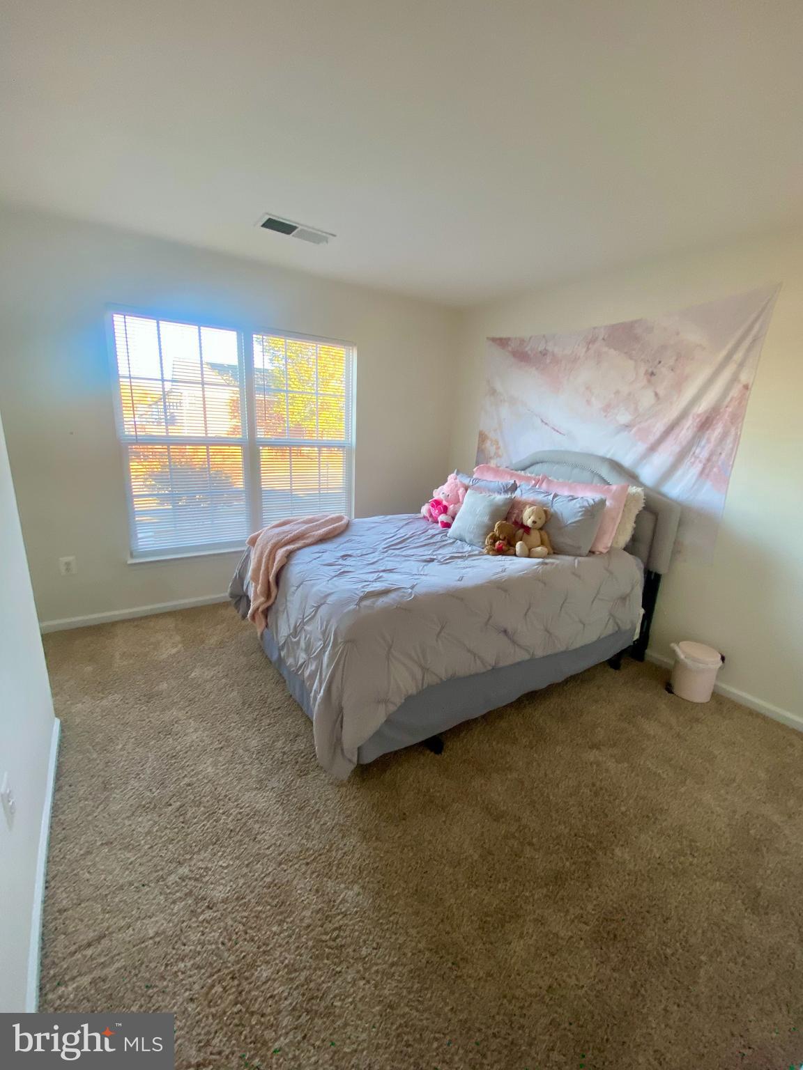 108 Davidson Street Stafford, VA 22554 - Photo 23 of 32 a bedroom with a bed and window