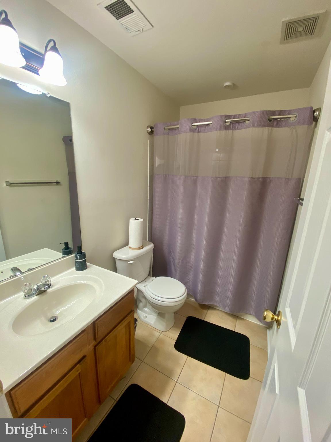 108 Davidson Street Stafford, VA 22554 - Photo 27 of 32 a bathroom with a sink and a mirror
