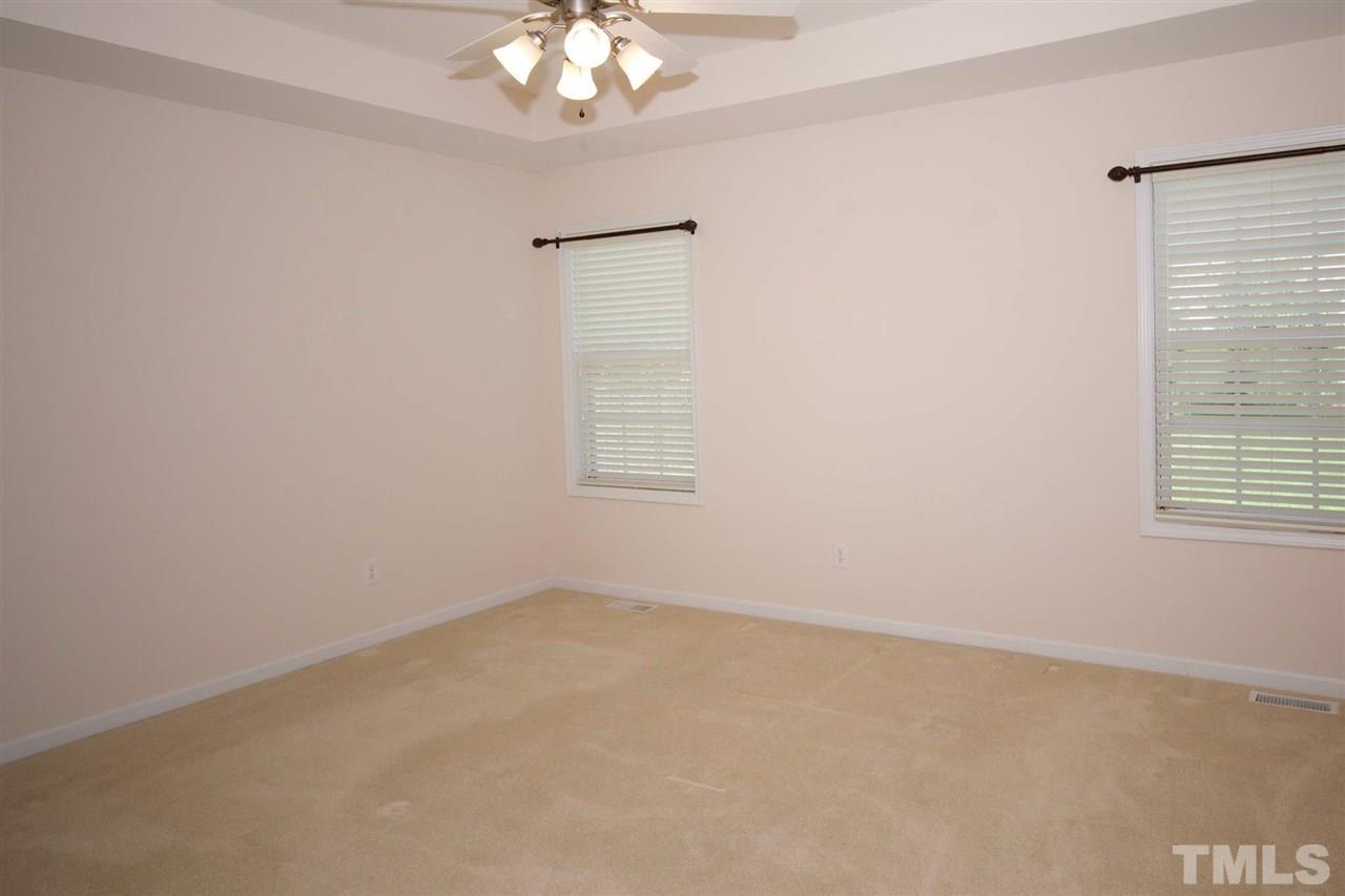 157 Mickleson Ridge Drive Raleigh, NC 27603 - Photo 19 of 30 an empty room with a window