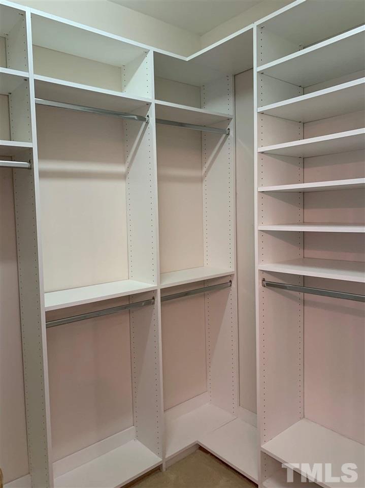 157 Mickleson Ridge Drive Raleigh, NC 27603 - Photo 20 of 30 a view of walk in closet with empty racks