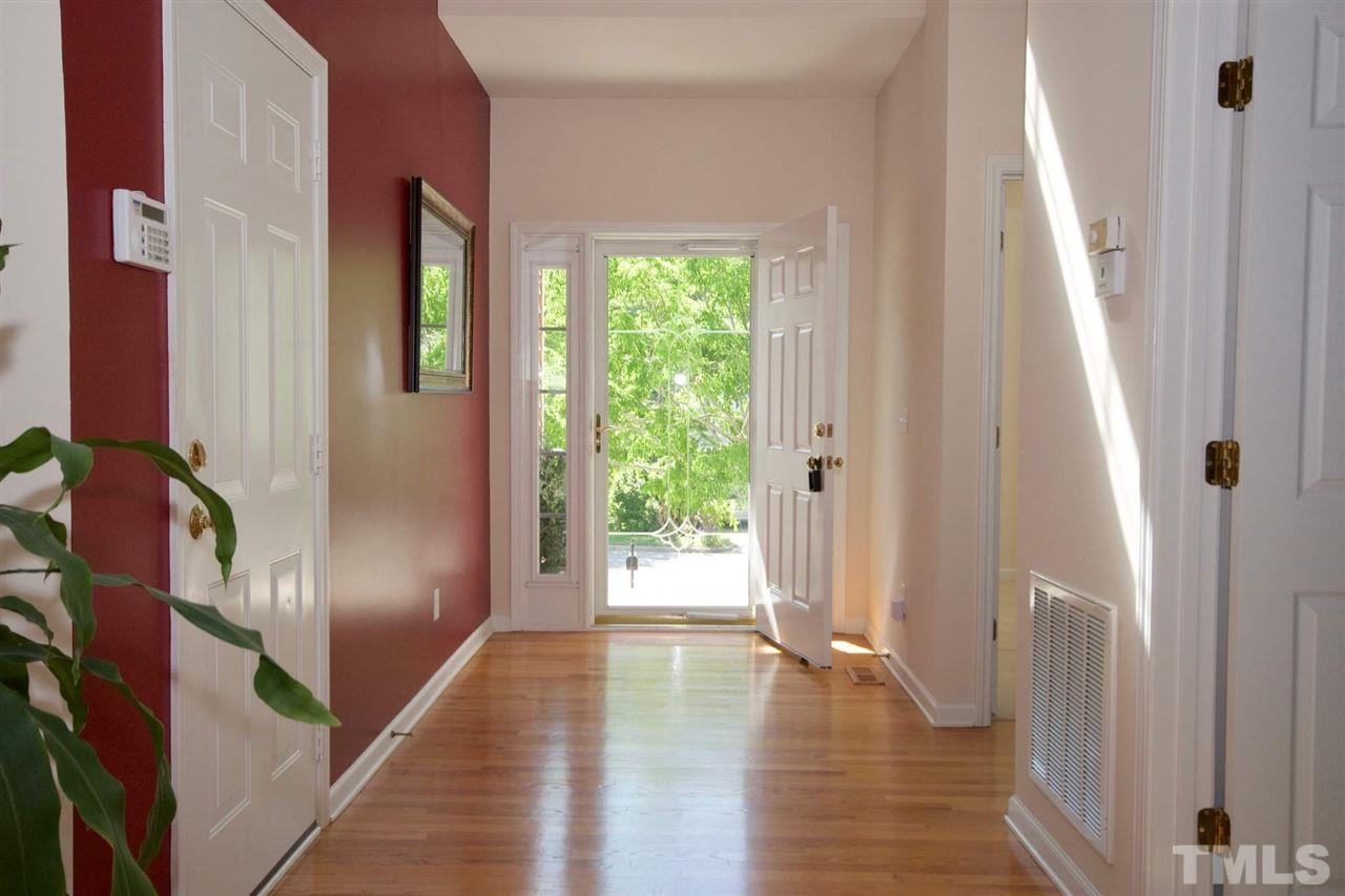 157 Mickleson Ridge Drive Raleigh, NC 27603 - Photo 3 of 30 a view of empty room with wooden floor and fan