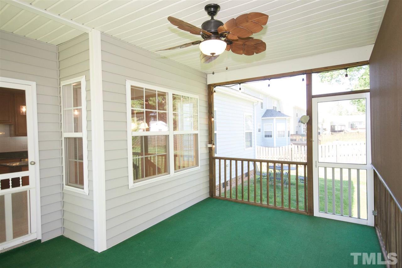 157 Mickleson Ridge Drive Raleigh, NC 27603 - Photo 27 of 30 a view of a porch with a backyard